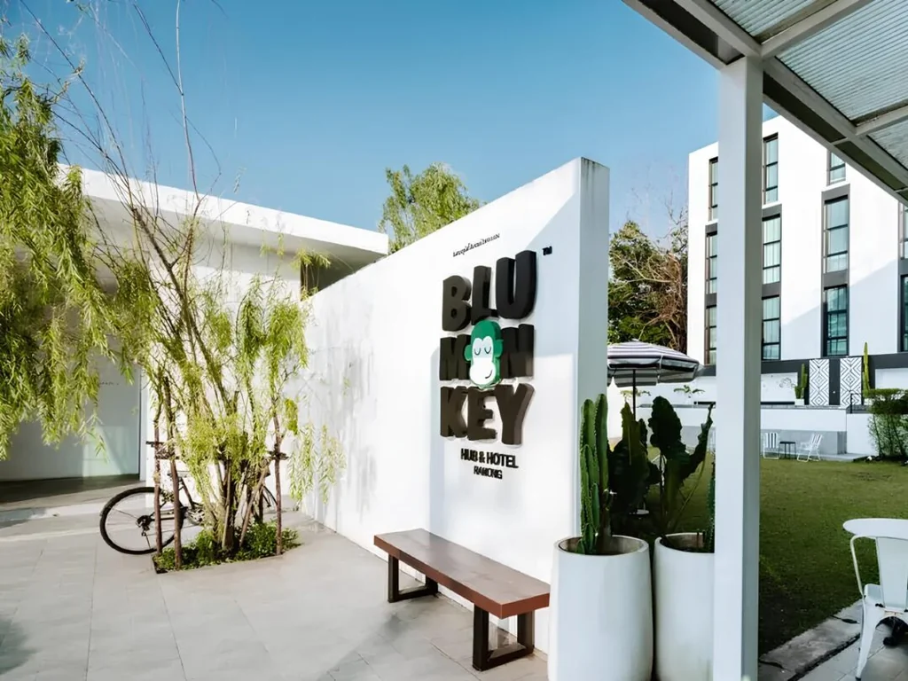 Blu Monkey Hub & Hotel Ranong sign and courtyard in Ranong town
